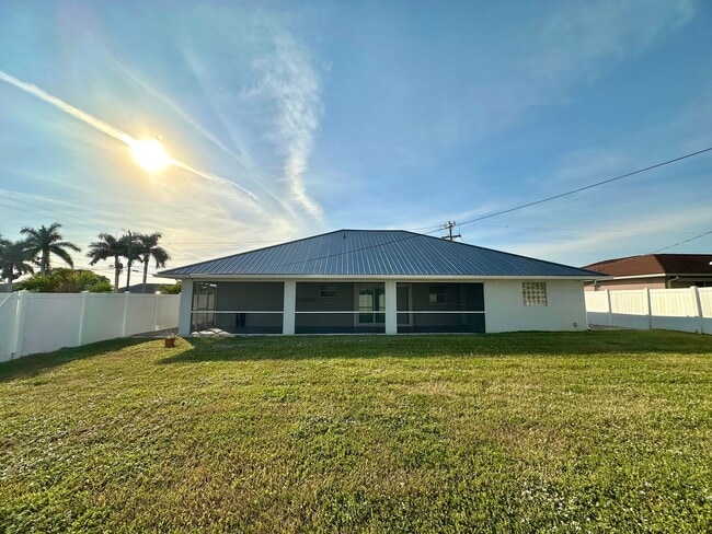 Photo - Stunning 3 Bedroom + Den Home with Fence + Screened Lanai in Great Location!