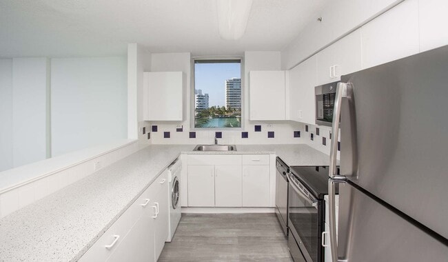 Kitchen features stainless steel appliances
