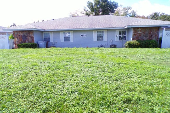 Building Photo - Spacious Vinyl-Sided 2BR Apartment with Open Layout, Private Patio, and Pet-Friendly Options – Av... Unit C