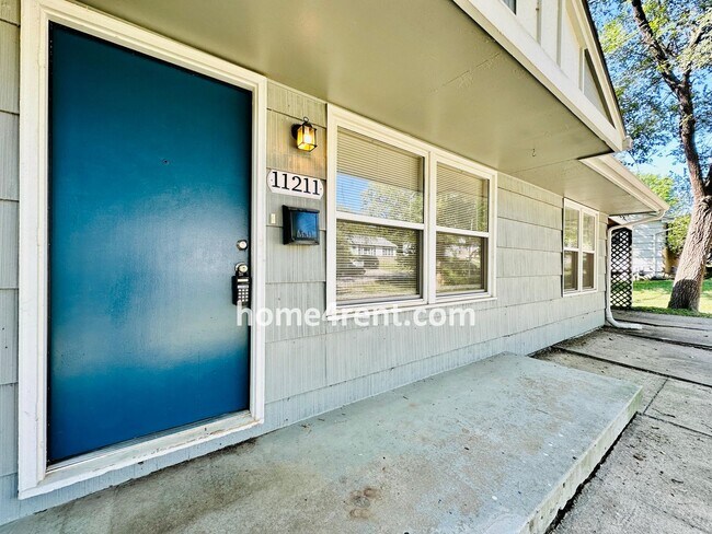 Photo - Ranch Style Home in KCMO w/ LVP Floors, SS Appliances and a Fenced Yard!