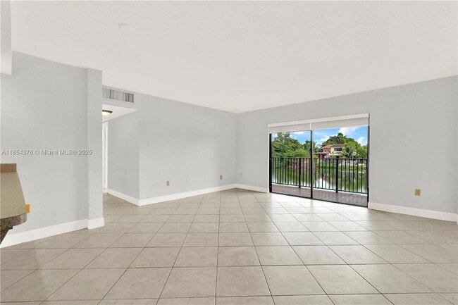 Photo - 1335 W 68th St Unit 207