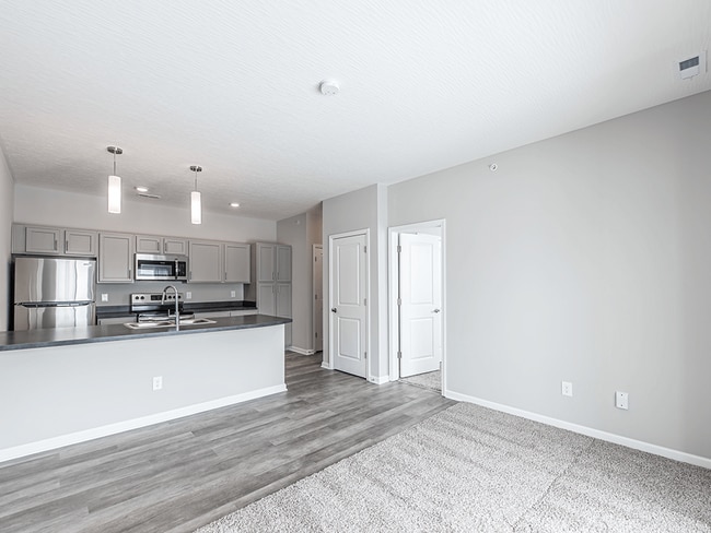 Seamless Connection Between Kitchen and Living Room - The District at Ashland