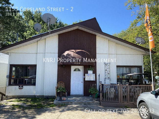 Building Photo - Two Bedroom Plus Den Unit 2