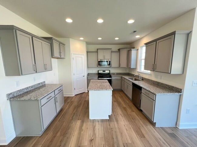 Photo - LIKE NEW 4 Bedroom Home w/ Ground Floor Be...