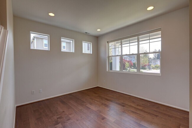 Photo - 4 Bedroom Home with Open Den, Living & Family Rooms – Space for Everyone