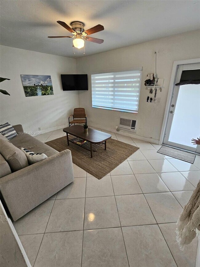 Building Photo - 7400 Harding Ave Unit 22