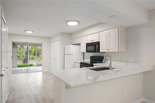 Photo - 3930 Leeward Passage Ct Unit 103
