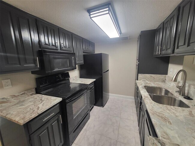 Photo - 12955 Woodforest Blvd Condo Unit 41