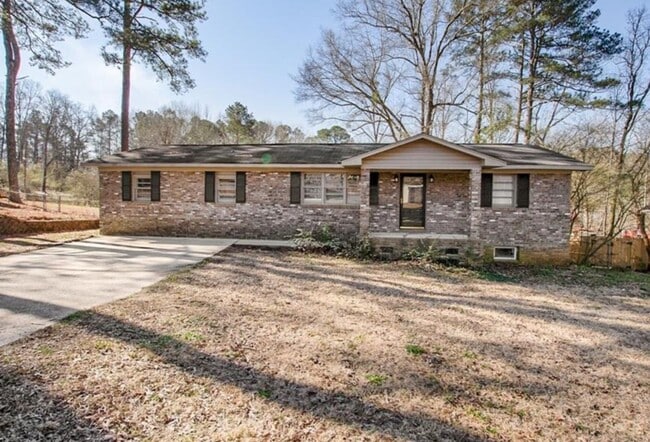 Building Photo - 3 bedroom, 2 bath - with a huge backyard and a walk in basement