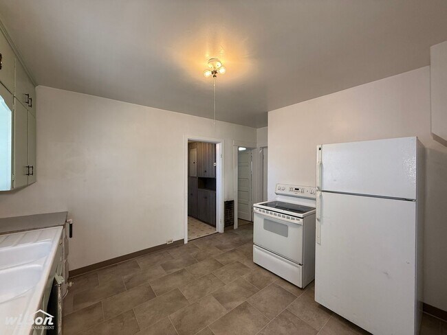 Photo - Cozy 2-Bedroom Home with Fenced Yard & Rear Parking!