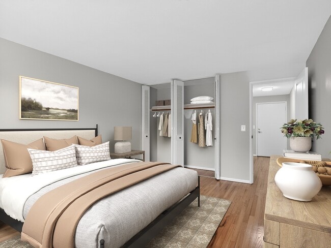 Welcome to Eagle Rock Apartments at West Hartford, where modern design meets comfort. This inviting bedroom features ample closet space and stylish decor, creating an ideal retreat. Schedule a tour today to envision your new home!