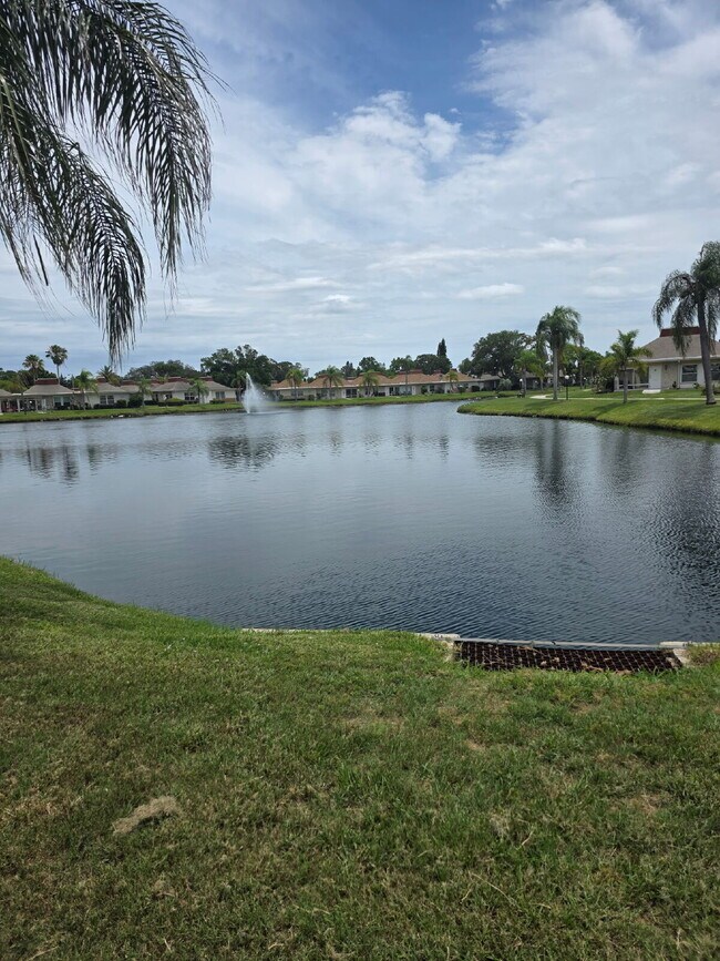 "Charming furnished 2-Bed Condo Retreat in Holiday, FL – Cozy 825 Sq Ft of Comfort!"