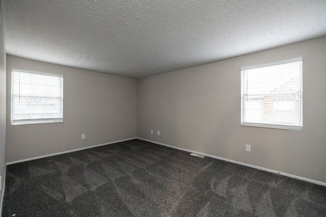 TOWNHOMES AT MCNAUGHTEN