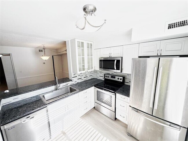 Photo - 709 Gardens Dr Unit 102