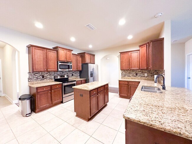 Photo - Well maintained 4 bedroom home with 2 car garage