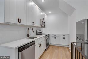 Building Photo - 4220 Baltimore Ave Unit A