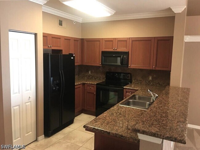 Photo - 10101 Villagio Palms Way Unidad 206