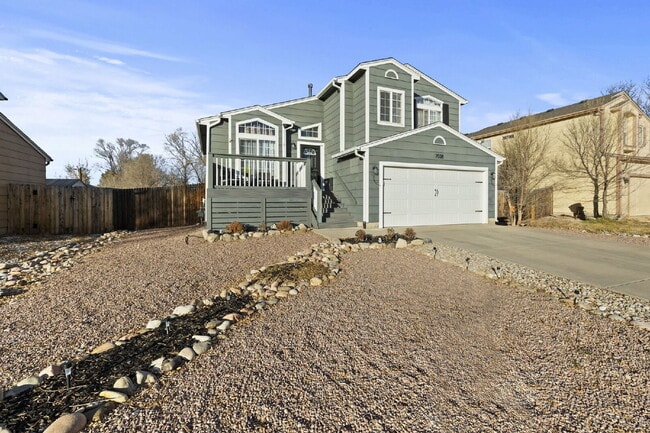 Photo - Bright & Spacious 4-Bedroom Home with Open-Concept Living, Fenced Yard & 2-Car Garage