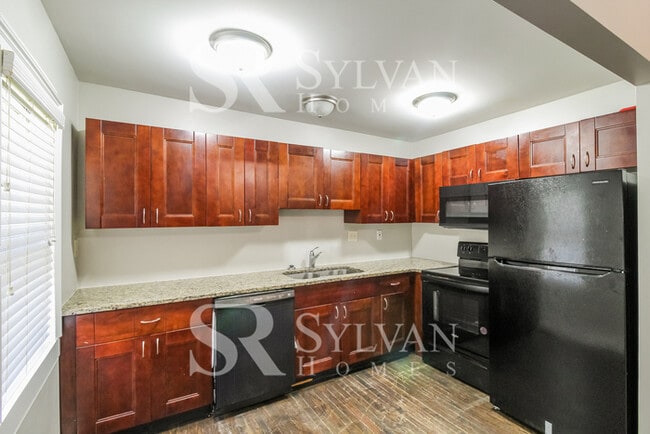 Photo - The living is easy in this 3 bedroom, 2 ba...