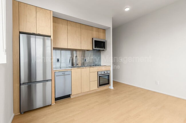 Building Photo - 7480 N Delaware Ave Unit 303