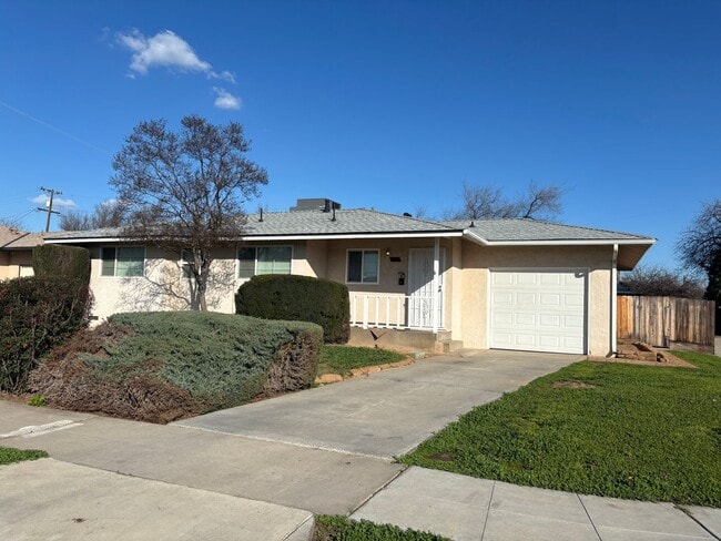 Building Photo - Updated 3 bedroom 2 bathroom home with large backyard, corner lot, close to shopping and schools ...