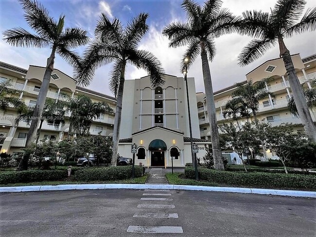 Building Photo - 10700 NW 66th St Unit 411
