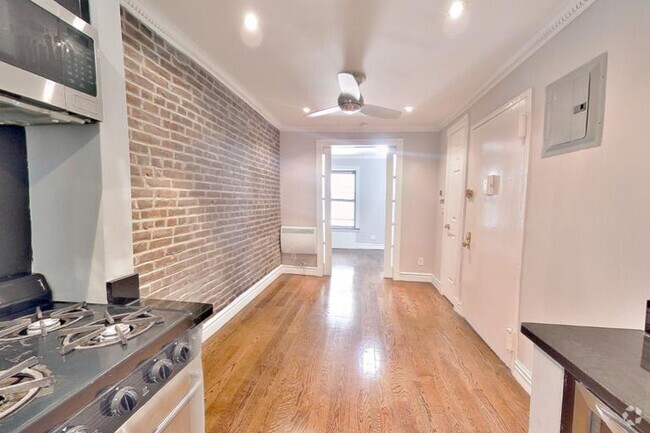 Building Photo - 345 W 53rd St Unit 2B Rental