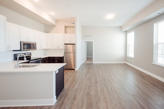 Embrace modern living with this bright and spacious open-concept kitchen and living area.