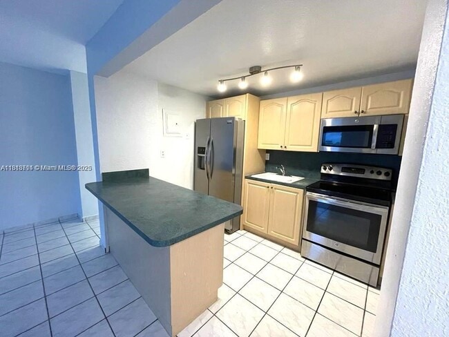 Photo - 4275 NW S Tamiami Canal Dr Condo Unit 2-108