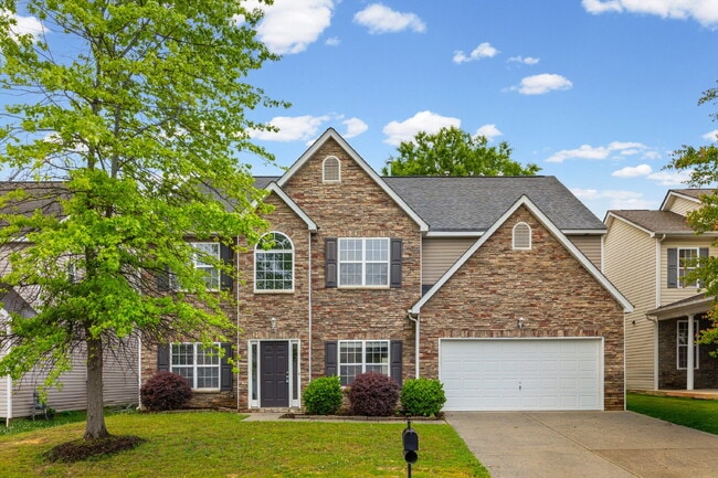 Building Photo - 4 bed/2.5 bath with dedicated office space!