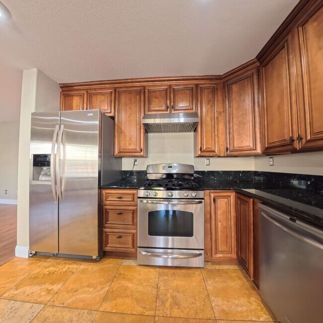 Photo - Stunning 2-Story Home with a Bedroom downstairs and a Backyard Oasis.