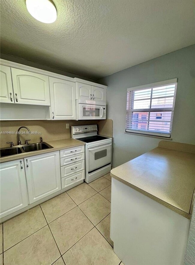 Photo - 1855 W 60th St Unit 446