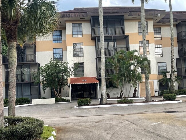 Building Photo - 5530 NW 44th St Unit 103C Rental