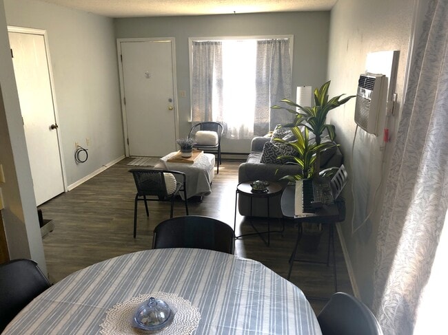 1 bedroom dining to living area - Parkway Village Apartments