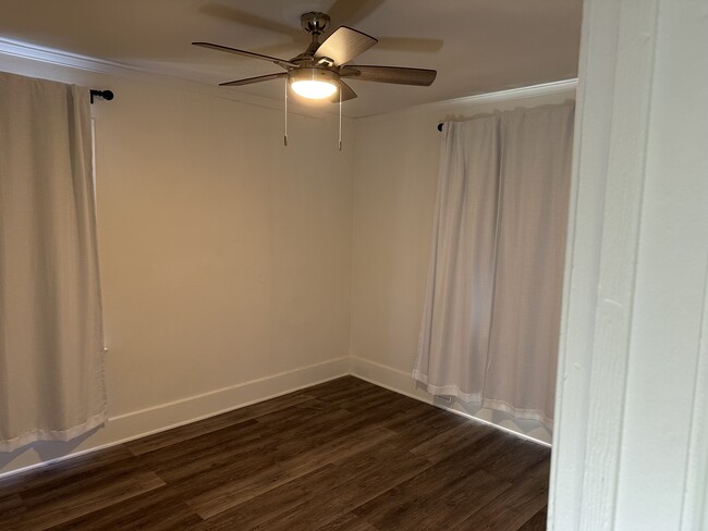 Walk in closer with lighted ceiling fan. Good sized bedroom perfect for a queen sized bed. - 5027 2nd Ave Apartment Unit 5027 2nd Ave