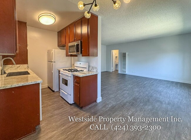 Building Photo - 12031 Pacific Ave Unit 9