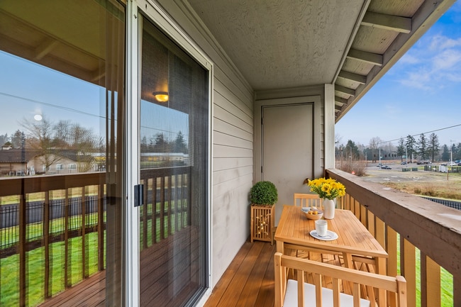 Experience relaxation on this beautifully designed balcony, perfect for enjoying your morning coffee.