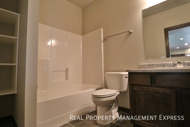 Photo - Beautiful 4 bedroom home with fenced in backyard!