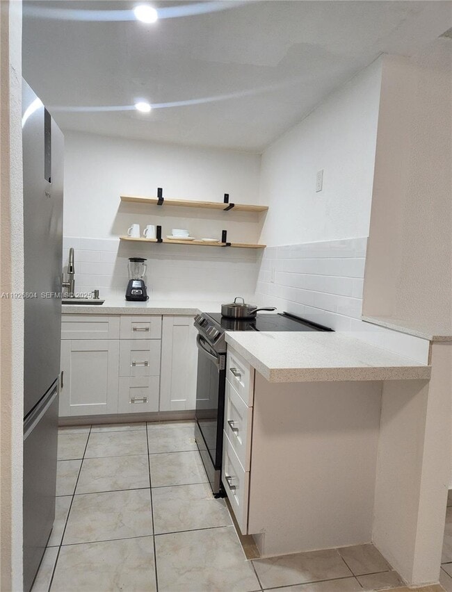 Photo - 666 W 81st St Unit 209