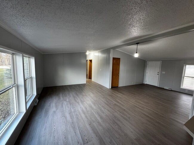 Photo - Very large yard great location a nice older doublewide Home