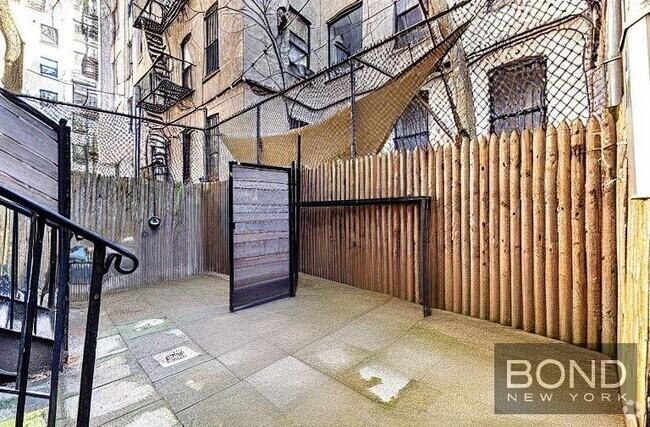 Building Photo - 610 E 9th St Unit 2R Rental