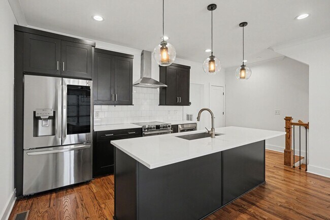 Photo - Downtown Views with Contemporary Comfort!