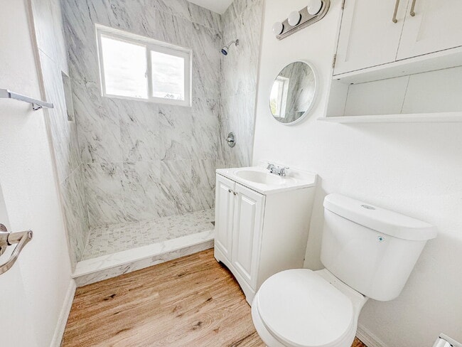 Photo - Large fenced yard! Central location!