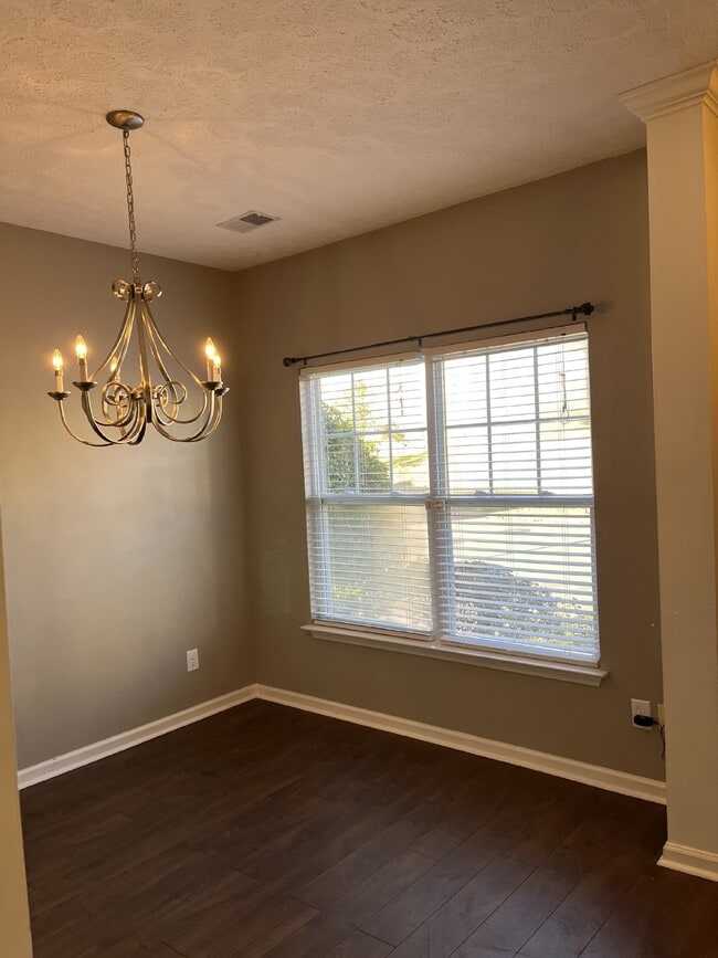 Building Photo - "Spacious 3-Bedroom Townhouse Retreat with Fireplace & Hardwood Floors in Antioch!" Unit 120