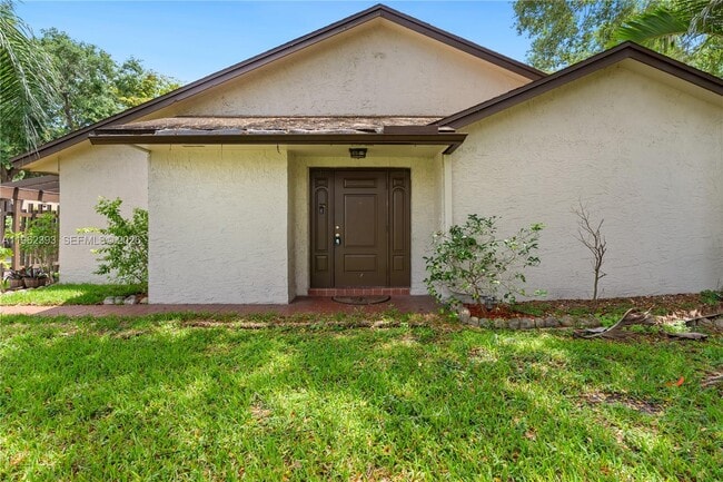 Building Photo - 9850 NW 15th Ct