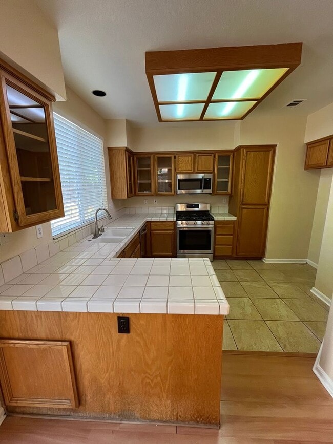 Photo - 3 Bed| 2 Bath | 1243 SF | 2 Car Garage | Single Story | Tenant pays $175 monthly for WS&G