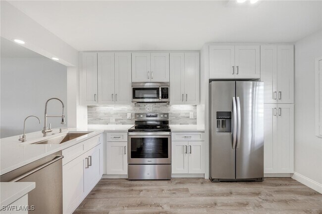 Building Photo - 7848 Emerald Cir Unit J101 Rental