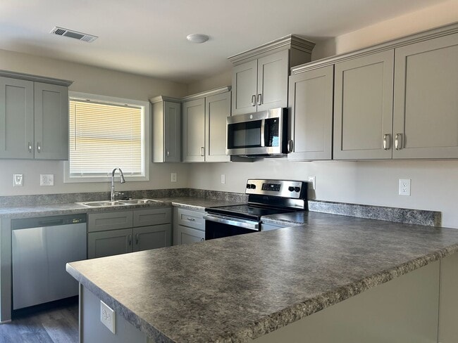 Photo - Three bedroom three bath available now!