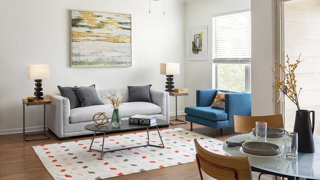 Apartment Living Room and Dining area with wood floors.