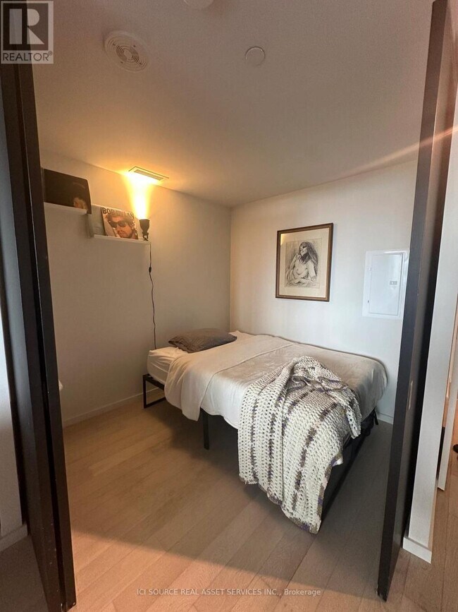 Photo - 21 Lawren Harris Square Unit 912